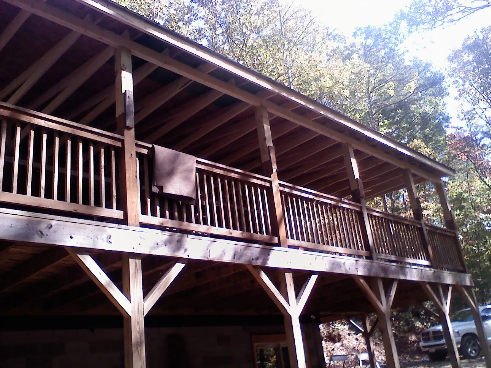 Timber framing under a new elevated porch and deck — Roof Leak Repair in Marana by Roofing Brothers
